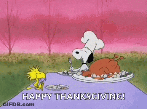Snoopy And Woodstock Are Sitting At A Table Eating Turkey . GIF