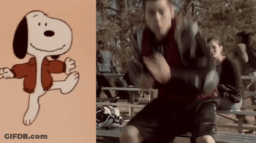 Snoopy Cartoon Next To Blurry Man GIF