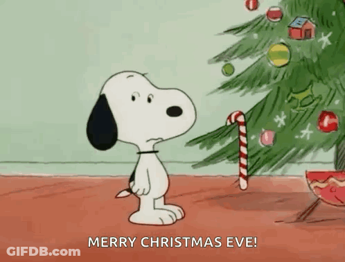 Snoopy Is Holding A Candy Cane In Front Of A Christmas Tree And Wishing Merry Christmas Eve . GIF