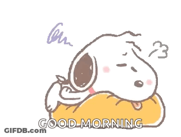 Snoopy Is Sitting On A Pillow With The Words `` Good Morning '' Written Below Him . GIF