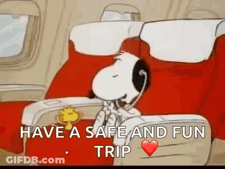 Snoopy Is Sitting On An Airplane Talking On A Telephone . GIF