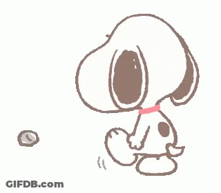 Snoopy Is Standing Next To A Rock And Looking At It . GIF