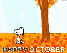 Snoopy Is Standing Next To A Tree In A Field Of Leaves And Says `` Happy October '' . GIF