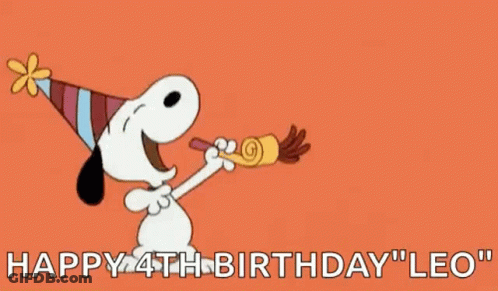 Snoopy Is Wearing A Party Hat And Blowing A Party Horn While Flying Through The Air . GIF