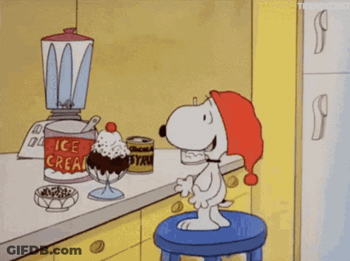 Snoopy On Stool With Ice Cream Can GIF