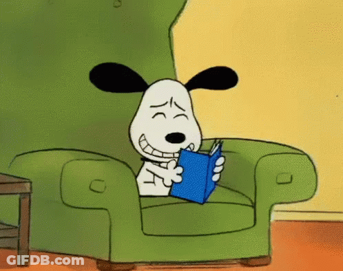 Snoopy Reading Book In Green Chair GIF