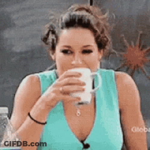 Snoopy Sitting With Eyes Closed And Hand In Mouth GIF