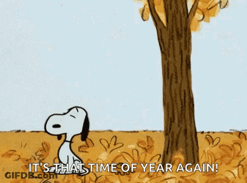 Snoopy Standing Next To Tree Holding Leaf GIF