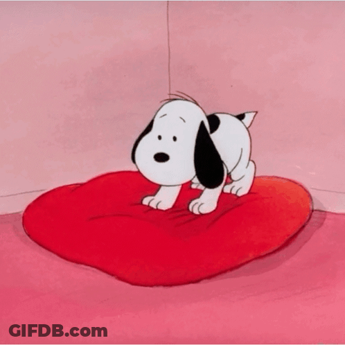 Snoopy Standing On Red Heart Shaped Pillow GIF