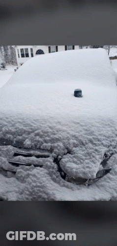 Snow Covered Car In Front Of House GIF