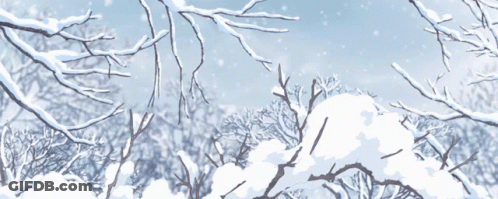 Snow Covered Trees Under Blue Sky GIF