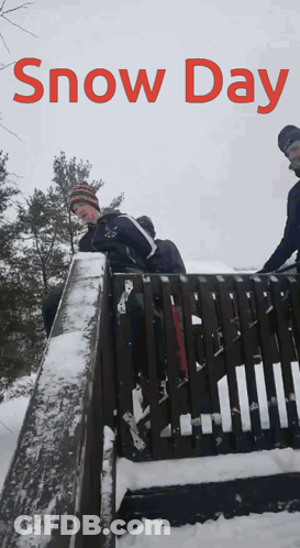 Snow Day Sign With People In Snow GIF
