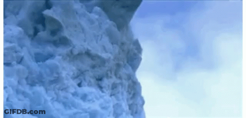Snow Pile Falling Down Cliff GIF