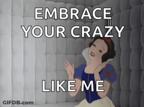 Snow White Is Sitting In A Cell With The Words `` Embrace Your Crazy Like Me '' Written On It . GIF