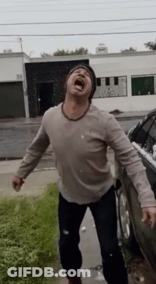 Snowball Fight Hit The Man's Face GIF
