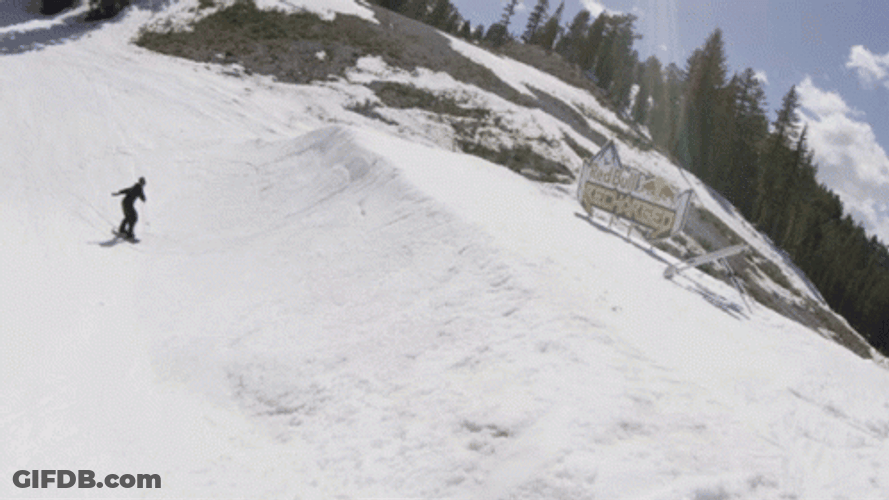 Snowboarding Spin Cliff Slide GIF