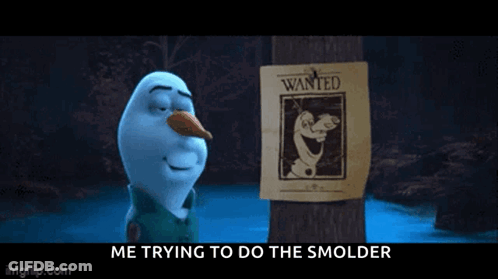 Snowman Next To Wanted Poster Saying Me Trying To Do The Smolder GIF
