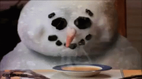 Snowman Sitting At Table With Soup GIF