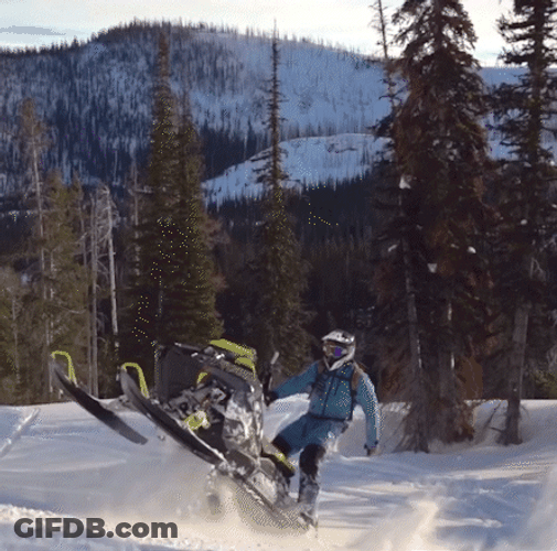 Snowmobile Wheelie In Slow Motion GIF
