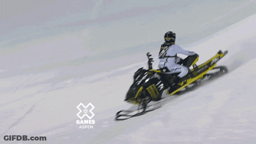 Snowmobile With A Rider Crashing GIF