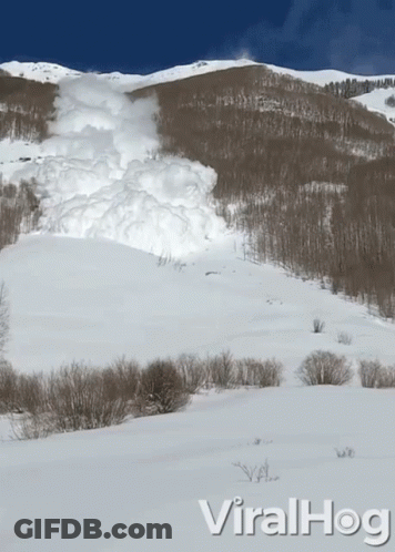 Snowy Mountain With Viralhog Text GIF