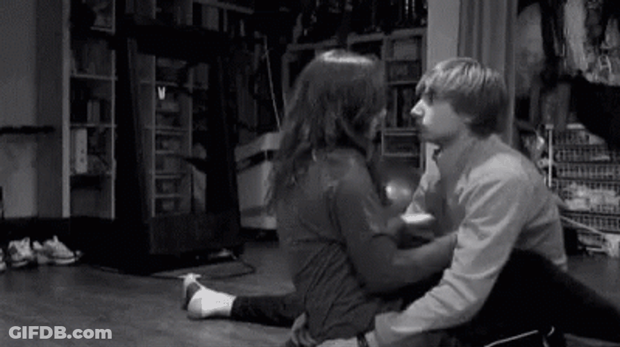 Snuggling Couple Comfort Hugs GIF