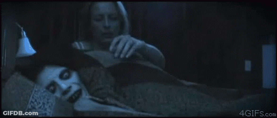 Snuggling Scary Face In Bed GIF