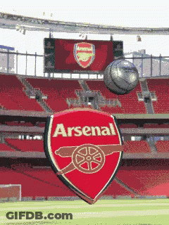 Soccer Ball Flying In Front Of Arsenal Logo GIF
