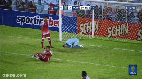 Soccer Game In Front Of Betting Banner GIF
