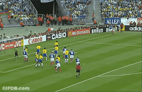 Soccer Game In Front Of Canon Banner GIF