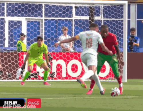 Soccer Game In Front Of Coca Cola Advertisement GIF