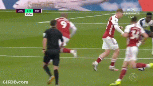 Soccer Game In Front Of Emirates Banner GIF