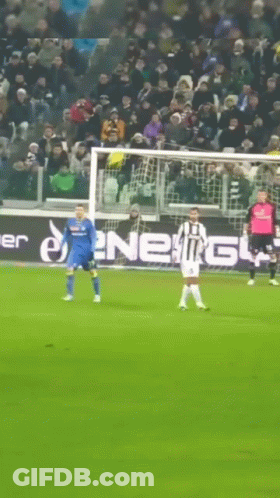 Soccer Game In Front Of Energy Ad GIF