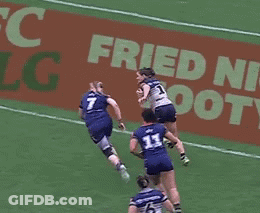 Soccer Game In Front Of Fried N Foot Sign GIF