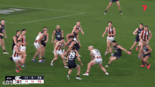 Soccer Game In Front Of Giant Thompson Banner GIF
