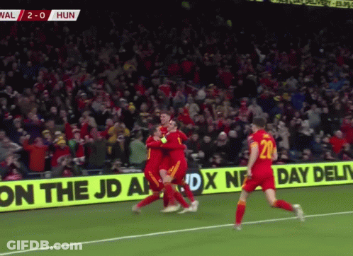Soccer Game In Front Of JD Ad GIF