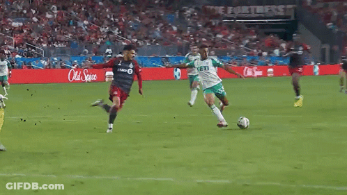 Soccer Game In Front Of Old Spice Ad GIF