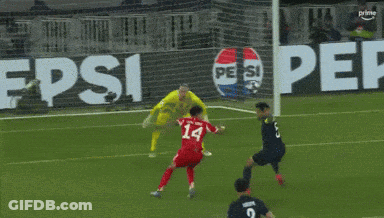 Soccer Game In Front Of Pepsi Ad GIF