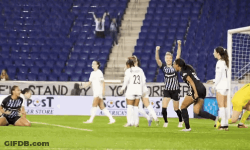 Soccer Game In Front Of Post Sign GIF
