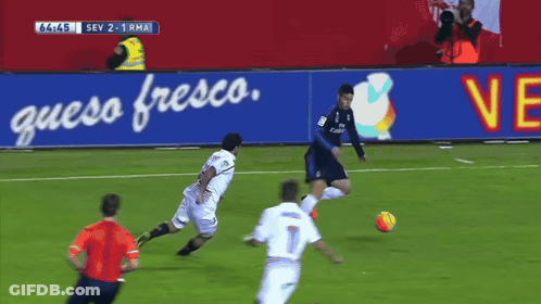 Soccer Game In Front Of Queso Fresco Sign GIF