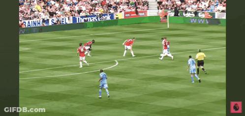Soccer Game In Front Of Rainhams Fell Banner GIF