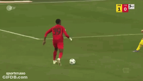 Soccer Game In Front Of Rheinmetall Banner GIF