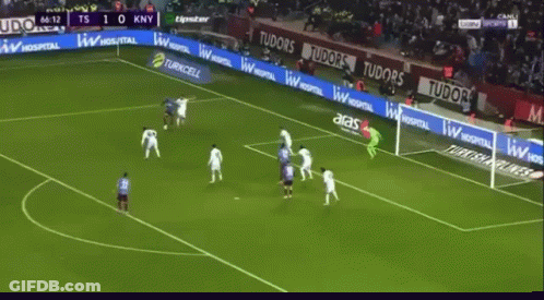 Soccer Game In Front Of Turkcell Banner GIF