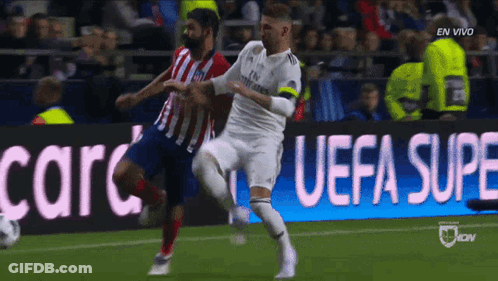 Soccer Game In Front Of UEFA Super Banner GIF