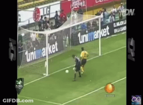 Soccer Game In Front Of Unimarket Banner GIF