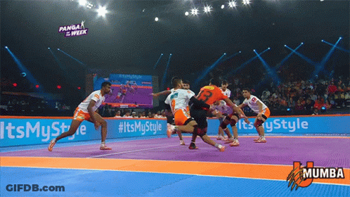Soccer Game In Stadium With Advertisements For Mumba GIF