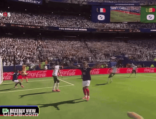 Soccer Game In Stadium With Coca Cola Ads GIF