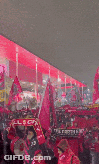 Soccer Game In Stadium With Coca Cola And Adidas Ads GIF