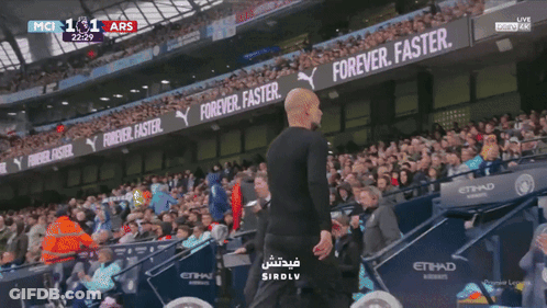 Soccer Game In Stadium With Forever Faster Banner GIF