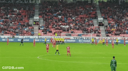 Soccer Game In Stadium With Tes Banner GIF